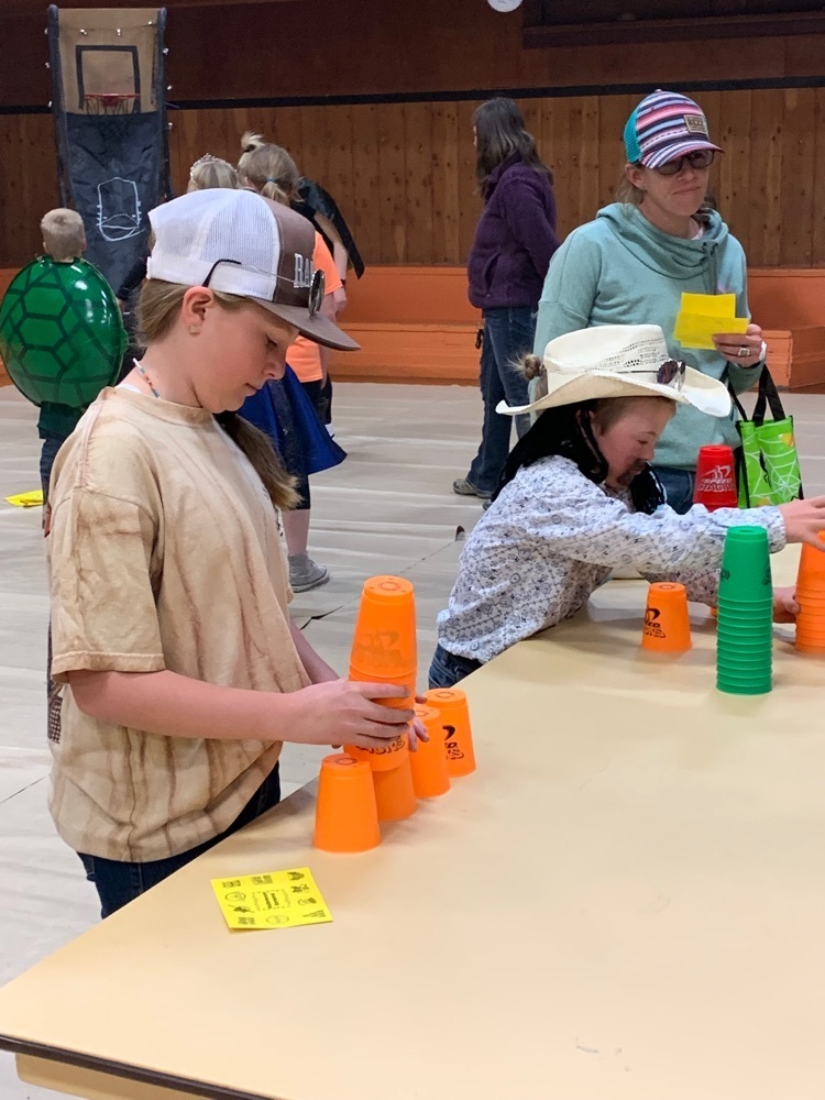 students cup stacking at carnival