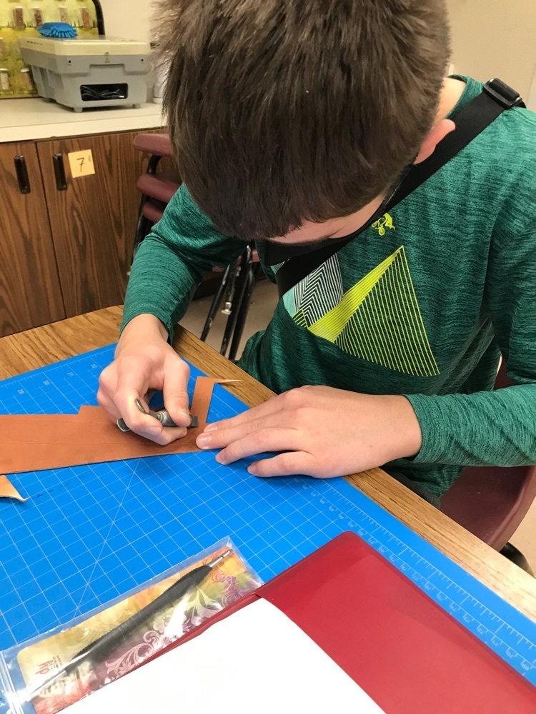 Student using a swivel knife