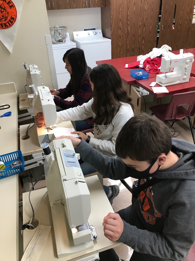 students sewing