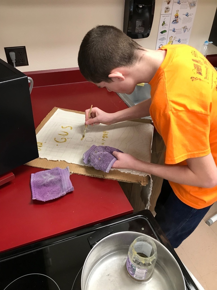 student using beeswax